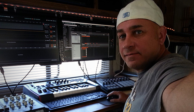 James in his studio producing while facing the beach.